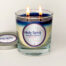 Holy Spirit two wick color changing candle, lid off, lit, blue