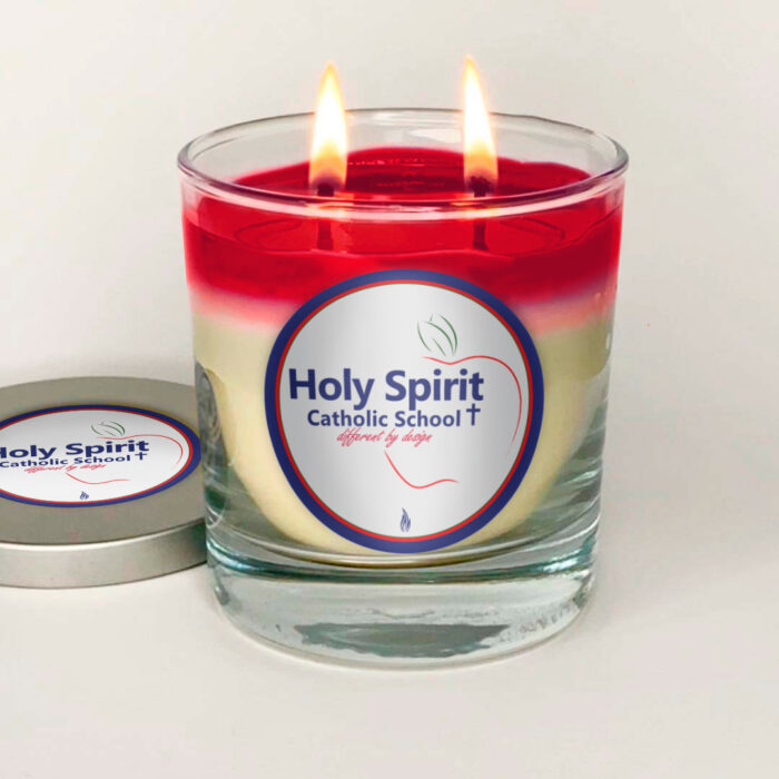 Holy Spirit two wick color changing candle, lid off, lit, red